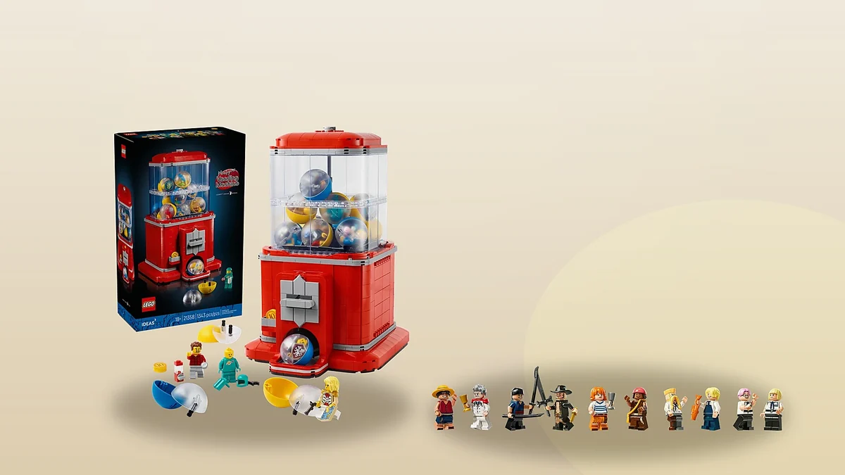 The LEGO Minifigure Vending Machine with a row of minifigures beside it on a warm background