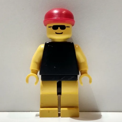 Man (Black Shirt, Yellow Legs, Red Cap)