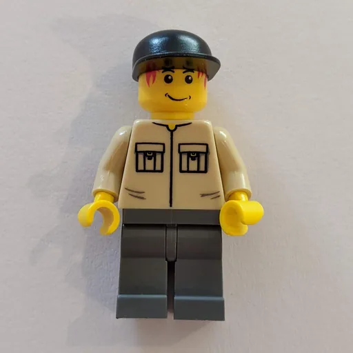 Man (Tan Shirt, Dark Bluish Gary Legs, Black Cap)