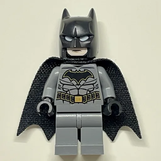 Batman (Dark Bluish Gray Suit, Black Cape and Cowl, Black Head, Dark Bluish Gray Legs, Gold Trim Batman Logo (39444 Cape))