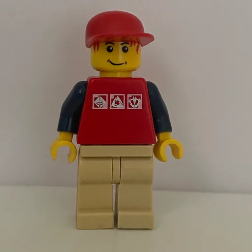 Man (Red Top with Dark Blue Arms, Tan Legs, Red Cap)